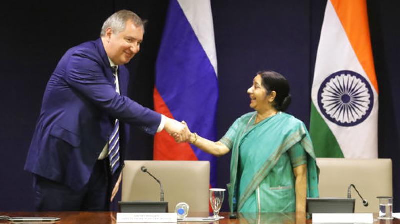 External Affairs Minister Sushma Swaraj, right, shakes hand with Russian Deputy Prime Minister Dmitry Rogozin after making a joint statement in New Delhi, India, Wednesday, May 10, 2017. (Photo: AP)