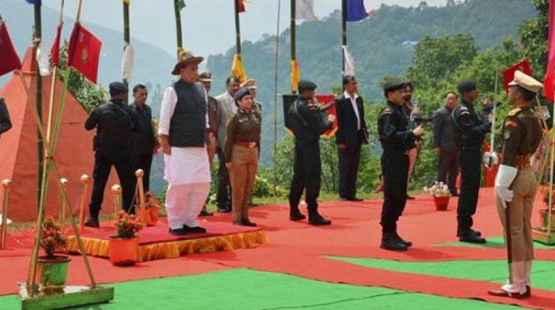 Union Home Minister Rajnath Singh taking salute during his visit to the 36th Batallion Gayzing in western Sikkim on Sunday. (Photo: PTI)