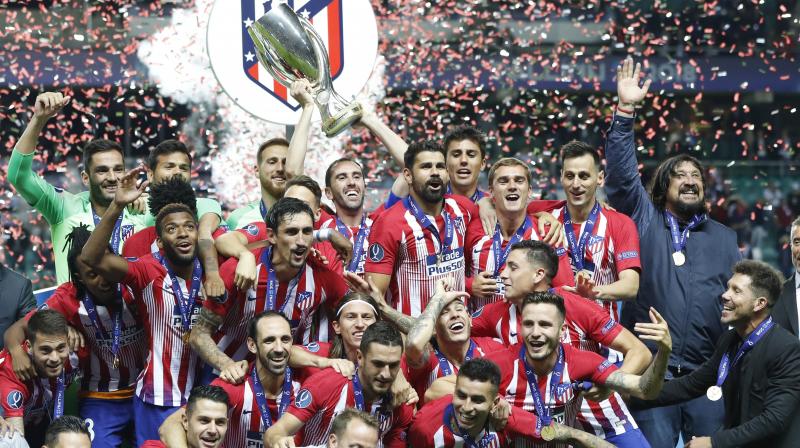 Saul Niguez and Koke scored in extra time as Atletico Madrid fought back to beat city rivals Real Madrid 4-2 and win the UEFA Super Cup. (Photo: AP)