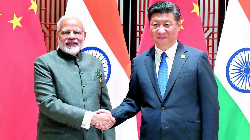 Prime Minister Narendra Modi and Chinas President Xi Jinping during a meeting on the sidelines of the Brics Summit in Xiamen on Tuesday. (Photo: PTI)