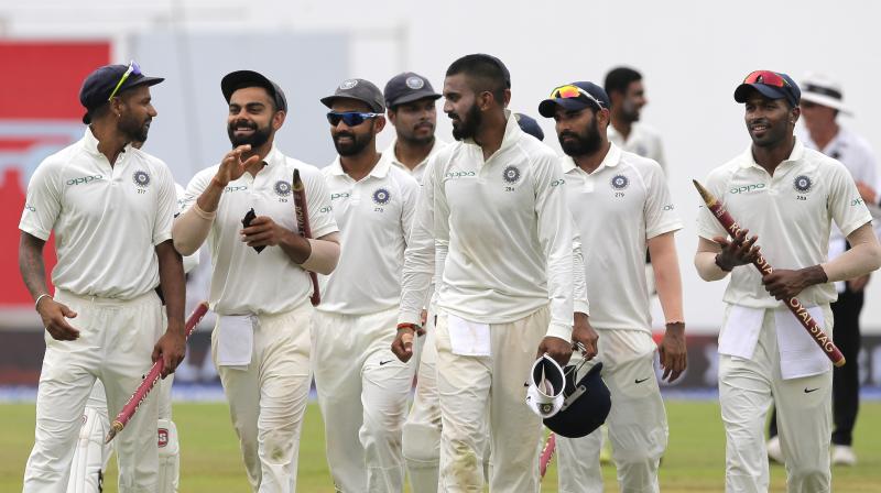 Virat Kohli led Indian side completed its first series cleans weep away from home as it defeated hosts Sri Lanka by an innings and 171 runs in the third and final Test of the series. (Photo: AP)