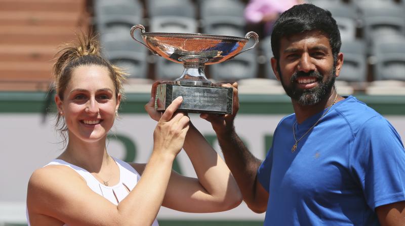 French Open champions Rohan Bopanna and Gabriela Dabrowski defeated the Croatian pair of Nikola Mektic and Ana Konjuh 7-6 (5), 6-2 to make it to the quarterfinals. (Photo: AP)