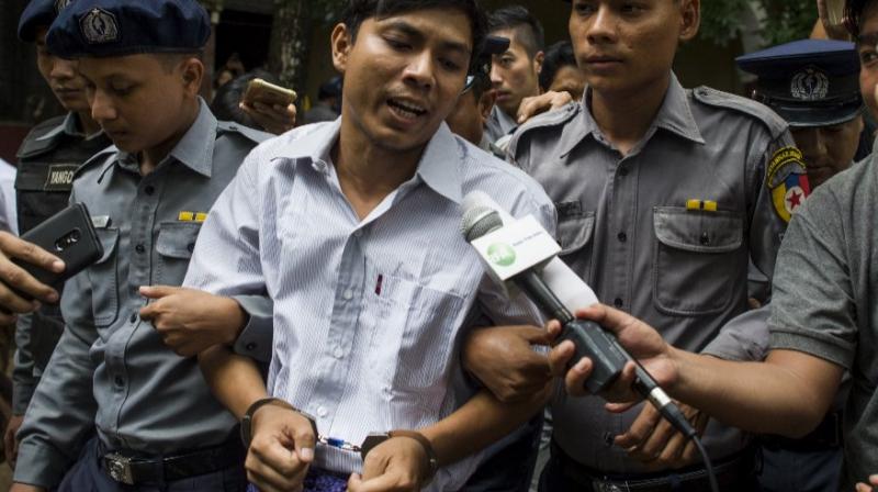The Myanmar nationals were arrested in December and accused of possession of sensitive material linked to security operations in crisis-hit Rakhine state. (Photo: AFP)