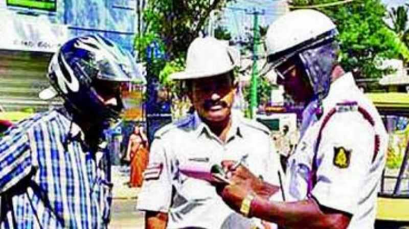 Traffic police issues Rs 100 e-challans to illegally parked vehicles but that is not enough. (Representational image)