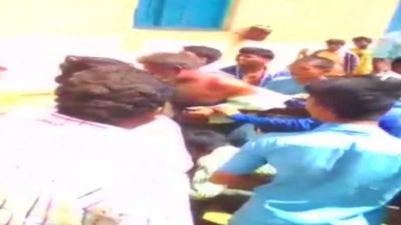 An angry mob had attacked the men after one of them spoke to a girl child in the village. (Photo: ANI video screengrab)