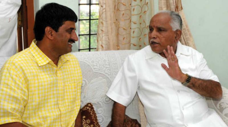 A file photo of former Channapatna MLA C.P. Yogeshwar with State BJP chief B.S. Yeddyurappa