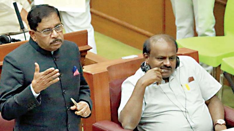 Deputy Chief Minister Dr G. Parameshwar speaks  during the winter session at Suvarna Vidhana Soudha in Belagavi on Tuesday, as Chief Minister H.D. Kumaraswamy looks on (Photo: KPN)