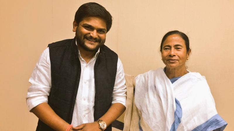 Equating West Bengal Chief Minister Mamata Banerjee (R) to Indias former prime minister Indira Gandhi, PAAS chief Hardik Patel (L) said he has never seen such a feisty leader. (Photo: Twitter | @HardikPatel_)