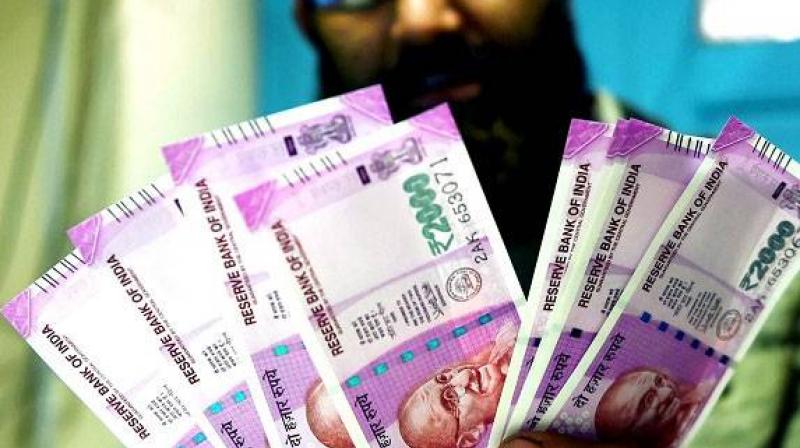 A family from Gujarats Ahmedabad drew the attention of police after they withdrew Rs 12.4 lakhs. (Photo: PTI/Representational)
