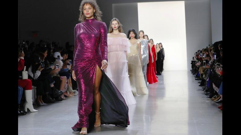 Tadashi Shojis collection was big on the glam factor with exquisite use of sequins, lace and velvet. (Photo: AP)