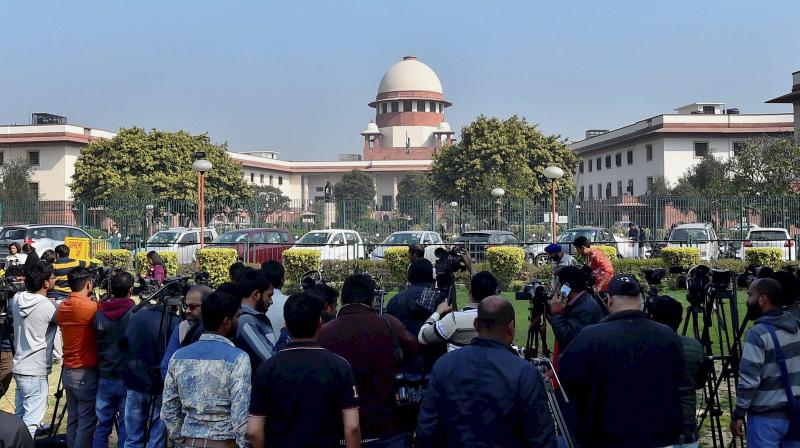 Mediapersons at Supreme Court of India during a Verdict on the disproportionate assets case in which AIADMK general secretary VK Sasikala, in New Delhi. (Photo: PTI)