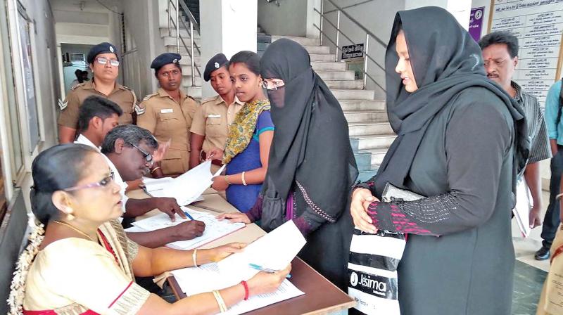 Application forms for Amma free scooter scheme being distributed at a corporation zone office on Monday. (Photo: DC)