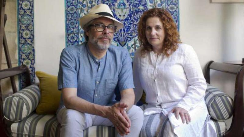 In this June 18, 2017 photo, authors Michael Chabon, left, and Ayelet Waldman pose for a photo at the launch of a new book of essays titled \Kingdom of Olive and Ash\ that describes the Israeli occupation of the West Bank, now in its 50th year, in Jerusalem. A group of renowned authors has published a collection of essays about IsraelÃ¢Â€Â™s occupation of the West Bank, hoping their grim firsthand perspectives will draw attention to what they describe as 50 years of oppressive and dehumanizing conditions (AP Photo/Oded Balilty)