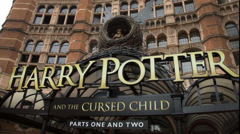 File photo shows the Palace Theatre in central London which is showing a stage production of, \Harry Potter and the Cursed Child.\ Harry Potter publisher Bloomsbury announced July 18, 2017, that two new books from the Harry Potter universe are set to be released in October as part of a British exhibition that celebrates the 20th anniversary of the launch of the series. (Photo by Joel Ryan/Invision/AP, File)