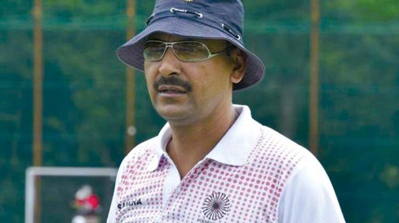 Coach Harendra Singh.