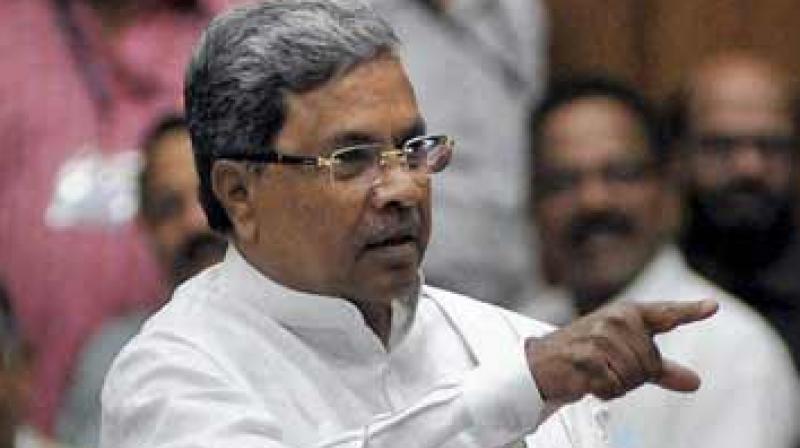 Asking Modi to take a strong stand against corruption, Siddaramaiah laid down four major controversies for the PM to initiate his action. (Photo: PTI/File)