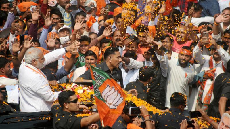 Huge crowd gathers during Prime Minister Narendra Modis roadshow in Varanasi. (Photo: PTI)
