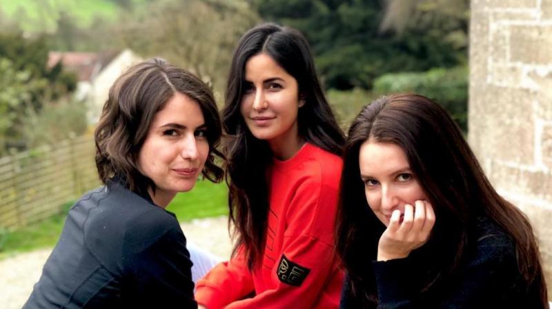 Katrina shared a photograph with her younger sisters Isabel and Sonia and captioned it,  Farm girls.