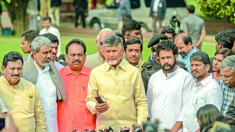Chief Minister N. Chandrababu Naidu, accompanied by a delegation, addresses the media after submitting a memorandum to President Ram Nath Kovind regarding the special status, in New Delhi, Tuesday.