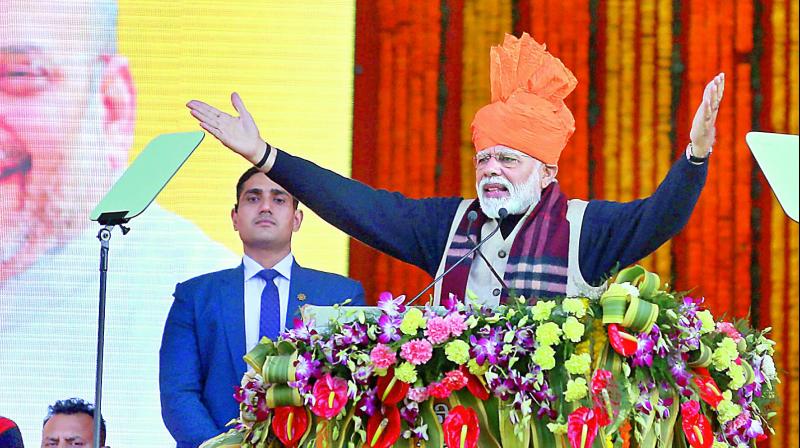 Prime Minister Narender Modi addresses a rally after setting the foundation stone of AIIMS and Jammu-Akhnoor four-lane highway at Vijaypur in Samba district of Jammu and Kashmir on Sunday. (Photo: AP)