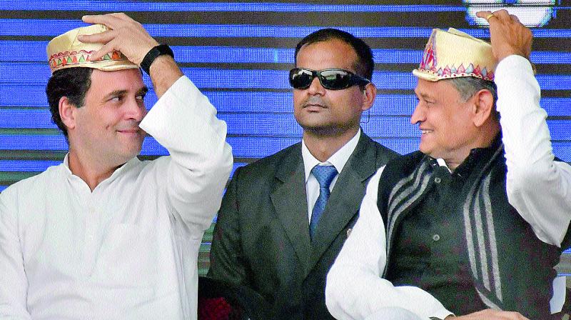 Congress president Rahul Gandhi and Rajasthan CM Ashok Gehlot at Gandhi Maidan in Patna, Sunday. (Photo: AP)