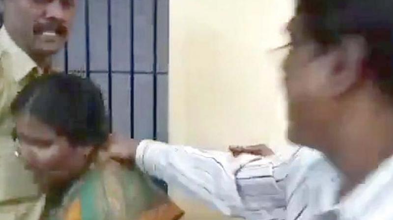 A video grab of the attack on a woman at the Kumaraswamy Layout police station.