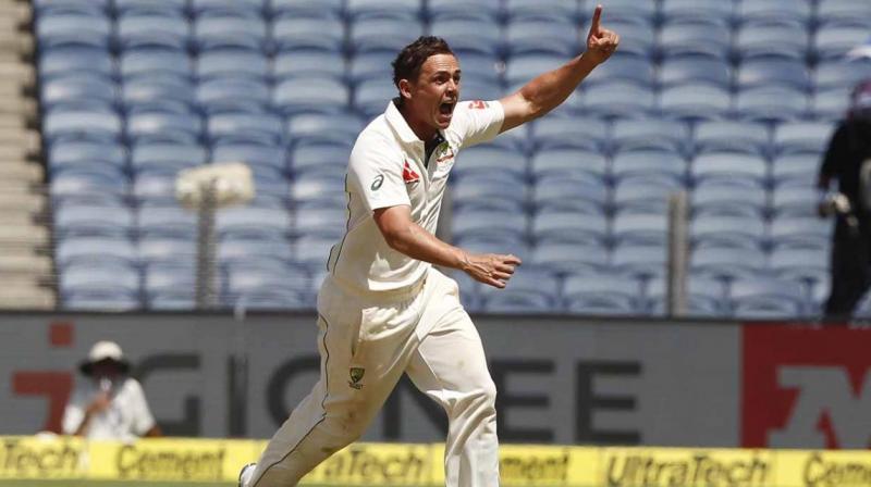 Steve OKeefe ran through the Indian batting line-up as he scalped 6 wickets conceding 35 runs on Day 2 of the first India versus Australia Test in Pune. (Photo: BCCI)