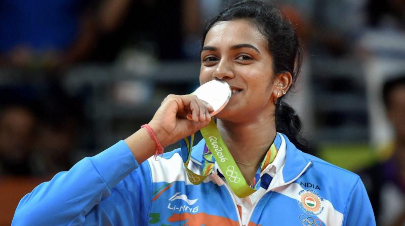 PV Sindhu made history after she became the first Indian woman shuttler to win an Olympic silver. (Photo: PTI)