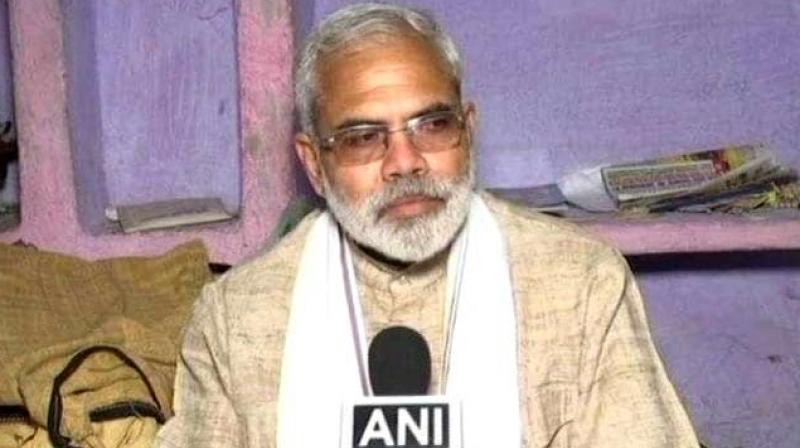 I am taken aback by seeing how the BJP is working in contrast to what PM Modi actually thinks and says. People have been asking me Acche din kab ayenge (when will good days come)? PM Modis lookalike Abhinandan Pathak said. (Photo: ANI)