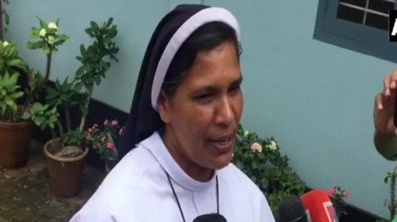 Sister Lucy, who joined a number of others outside the Kochi High Court to stage a protest against the rape-accused Bishop, was reportedly barred from her duties and relieved from church activities on Sunday. (Photo: ANI)