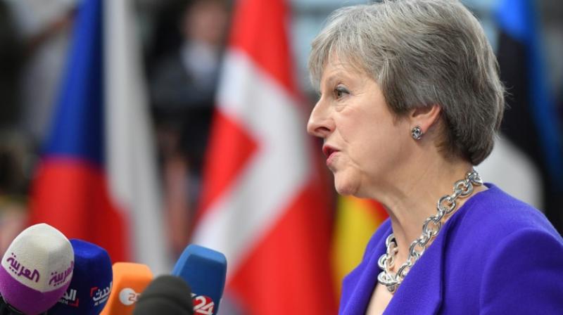 Prime Minister Theresa May says she Britain will consider extending the transition period after Brexit for a few months. (Photo: AFP)
