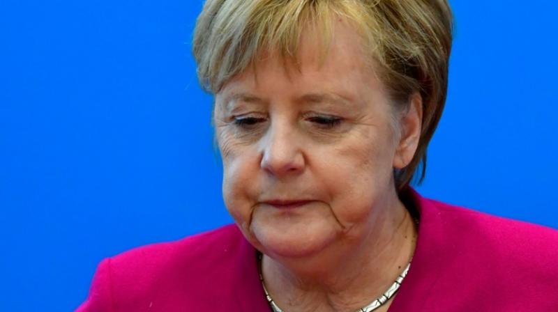 Often hailed as the worlds most powerful woman and Europes de facto leader, a weakened Merkel has faced growing calls to spell out her succession plans after 13 years in power. (Photo: AFP)