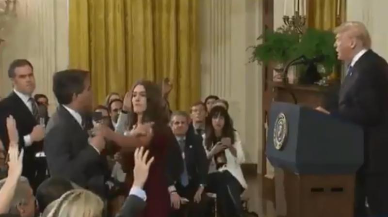 A frame-by-frame comparison with an Associated Press video of the same incident shows that the one tweeted by Sanders appears to have been altered to speed up Acostas arm movement as he touches the interns arm, according to Abba Shapiro, an independent video producer. (Photo: Twitter Screengrab | @PressSec)