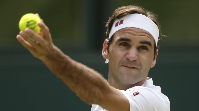 During his Wimbledon fourth-round victory over Adrian Mannarino on Monday, with the ball having already been called out, Federer played a stroke that was more akin to cricket than tennis. (Photo: AP)