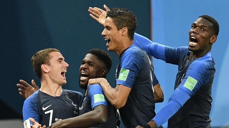 French players celebrate their match-winning goal. (Photo: AP)