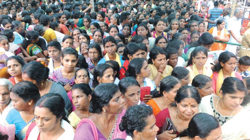 Devotees occupy the space near the Attukal temple ahead of Pongala in Thiruvananthapuram on Friday.	(Photo: A.V. MUZAFAR)