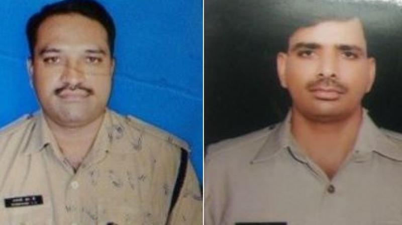 CRPF jawans Dhanawade Ravindra and Jaswant Singh who lost their lives in Pulwama encounter on Saturday. (Photo: ANI | Twitter)