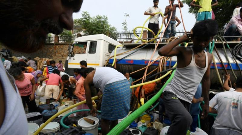 Tempers fray, fists fly in Indias daily battle for water