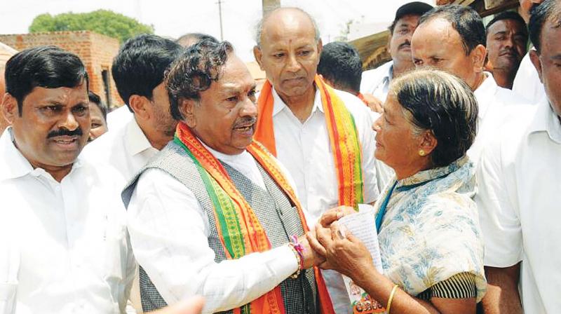 Senior BJP leader K.S. Eshwarappa campaigns in Nanjangud on Tuesday