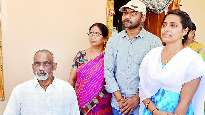 Dr K. Rammurthy, who reached home after four years of captivity, speaks to the media with his family at Dondapadu near Eluru, West Godavari, on Sunday.  (Photo: DC)