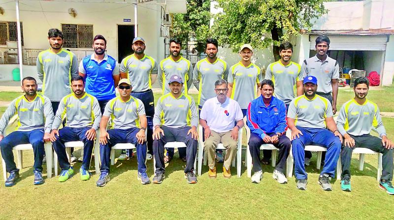 Members of the Andhra Bank team pose after winning the HCAs A Division One-day Knockout Championship.