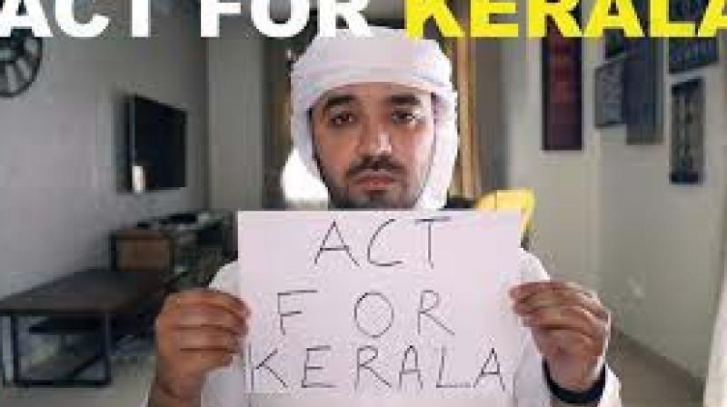 Mr Ameri was carrying a poster etched with the catchword  Act for Kerala  on the video seeking emotional and financial support for Kerala.