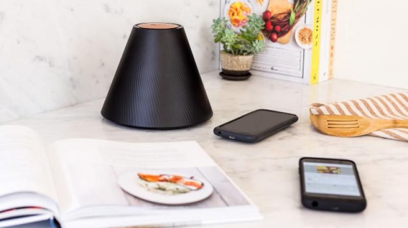 Pis conical wireless charger can charge any supported device place within a foot of the device.