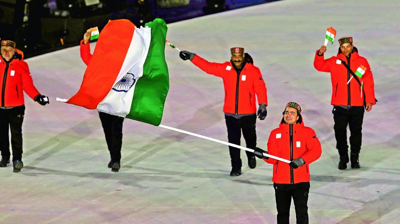 Shiva Keshavan carries the Indian flag during the opening ceremony of the Winter Olympics in Pyeongchang, South Korea, on Friday. (Photo: Ap)