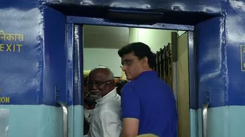 Flanked by police constables, Sourav Ganguly got into an argument with a fellow passenger about who the seat belonged to. (Photo: Screengrab/ Youtube)