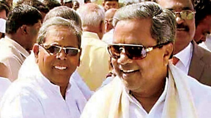 Former excise minister H.Y. Meti with Chief Minister Siddaramaiah in a file photo