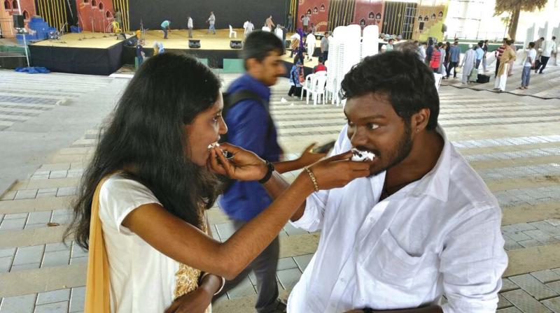 Vishnu S.S. and Arathy S.A. share a cake after they got married on Friday. (Photo: DC)