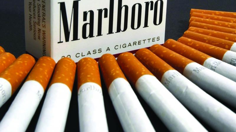 Philip Morris has for years indirectly paid costs related to Marlboro cigarette manufacturing, but company has denied any violation of rules