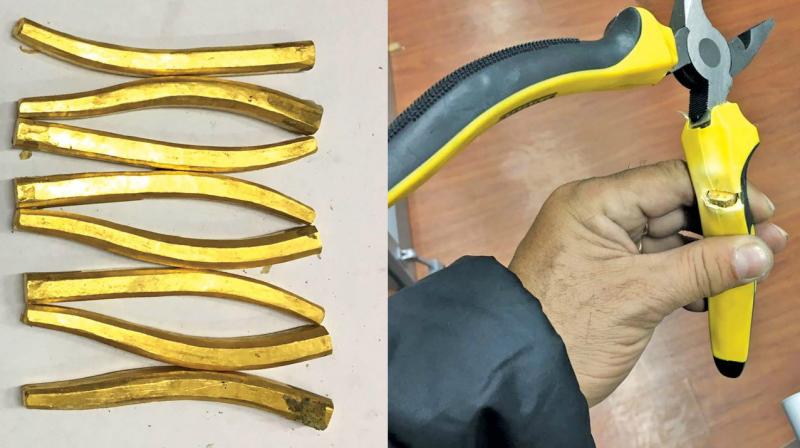 Handles made of gold found attached to the cutting  pliers. (Photo: DC)