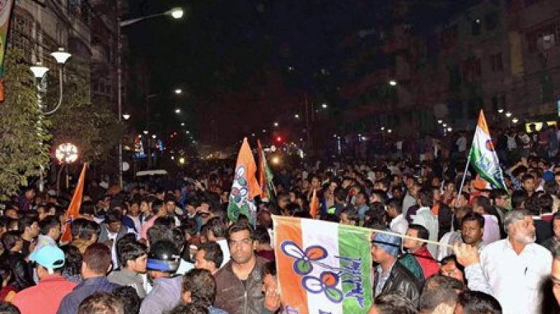 Trinamool Congress activists shouting slogans in front of BJP State party office in Kolkata on Tuesday over the arrest of Sudip Bandyopadhyay. (Photo: PTI)